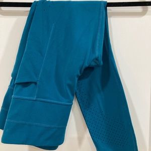 ATHLETA leggings with die cut sides and pockets
